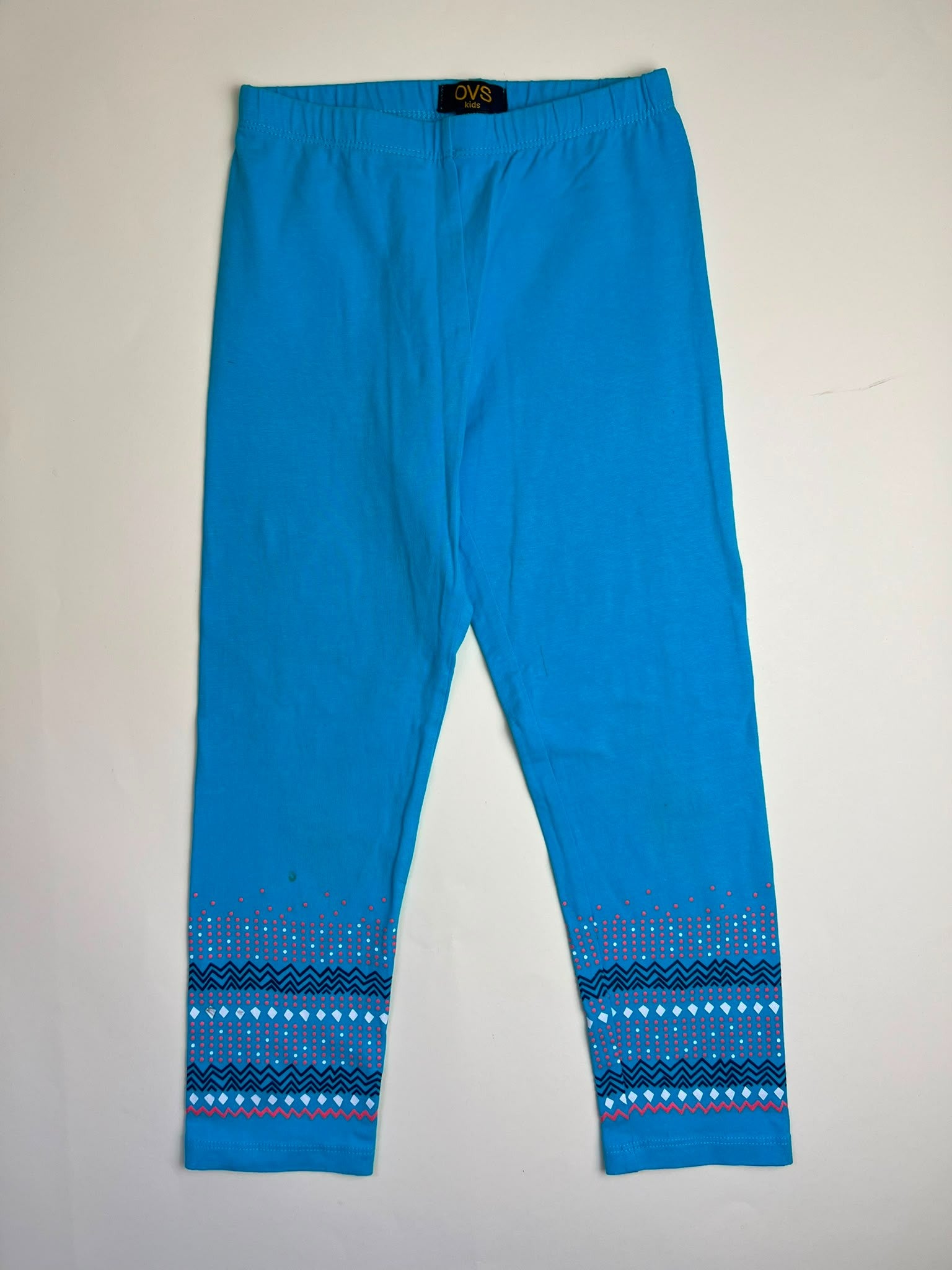 Leggings blu turchese con fantasia geometrica