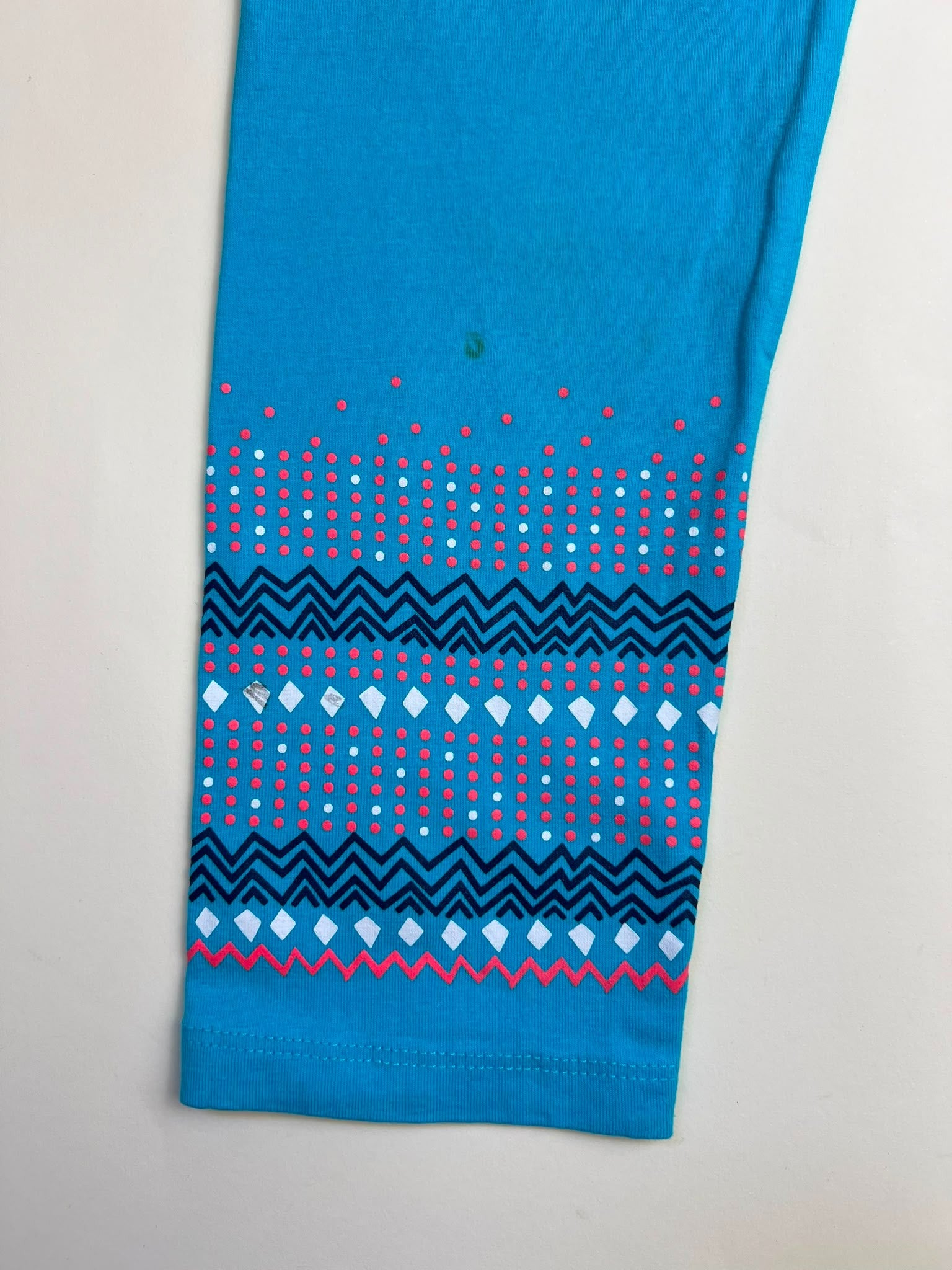 Leggings blu turchese con fantasia geometrica