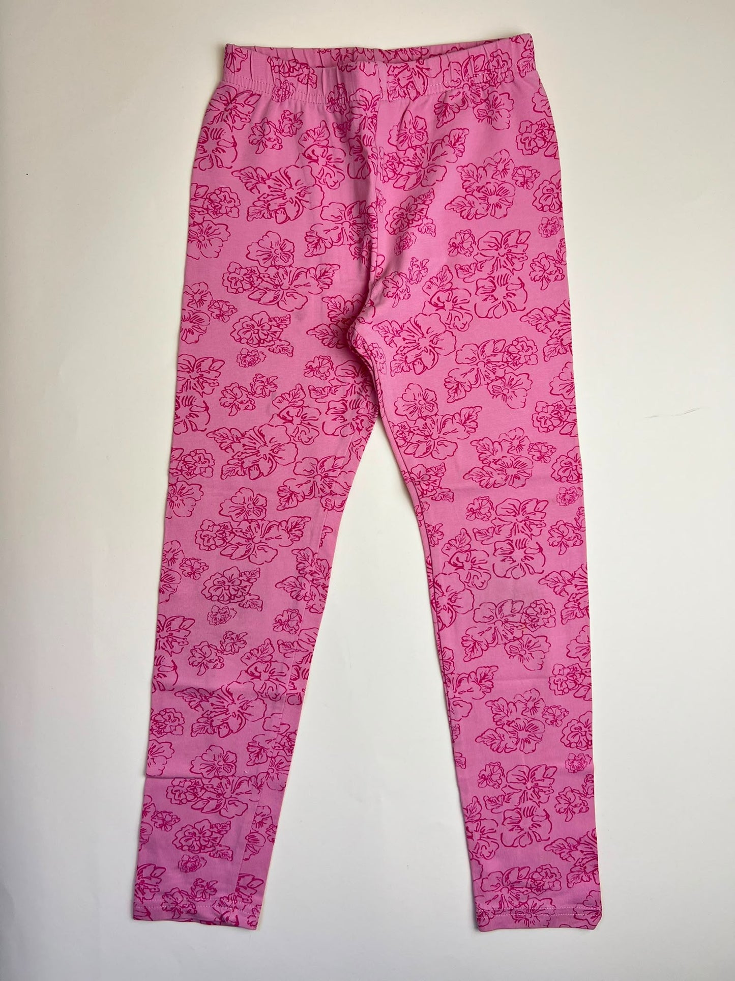 Leggings rosa con fantasia floreale