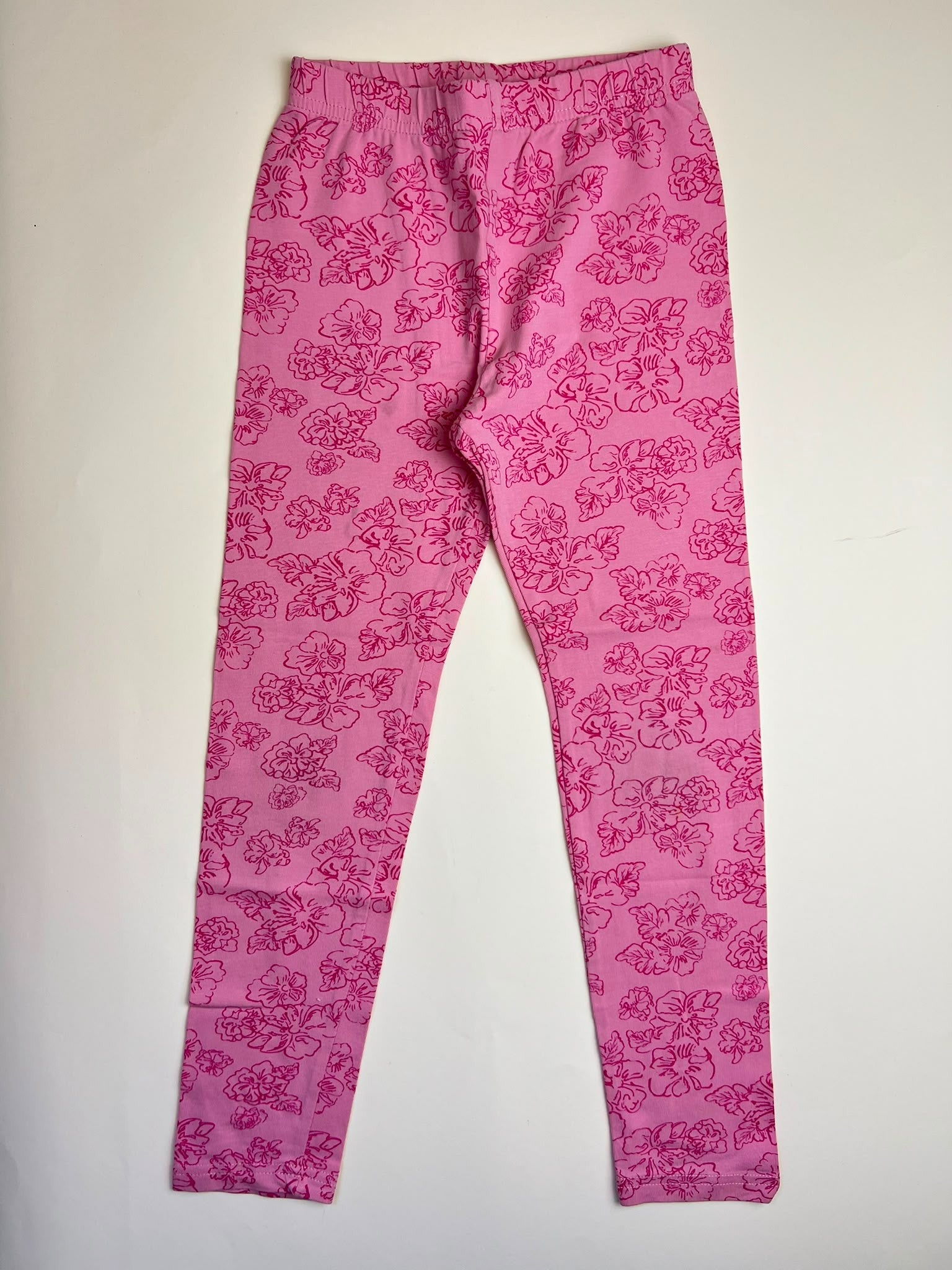 Leggings rosa con fantasia floreale