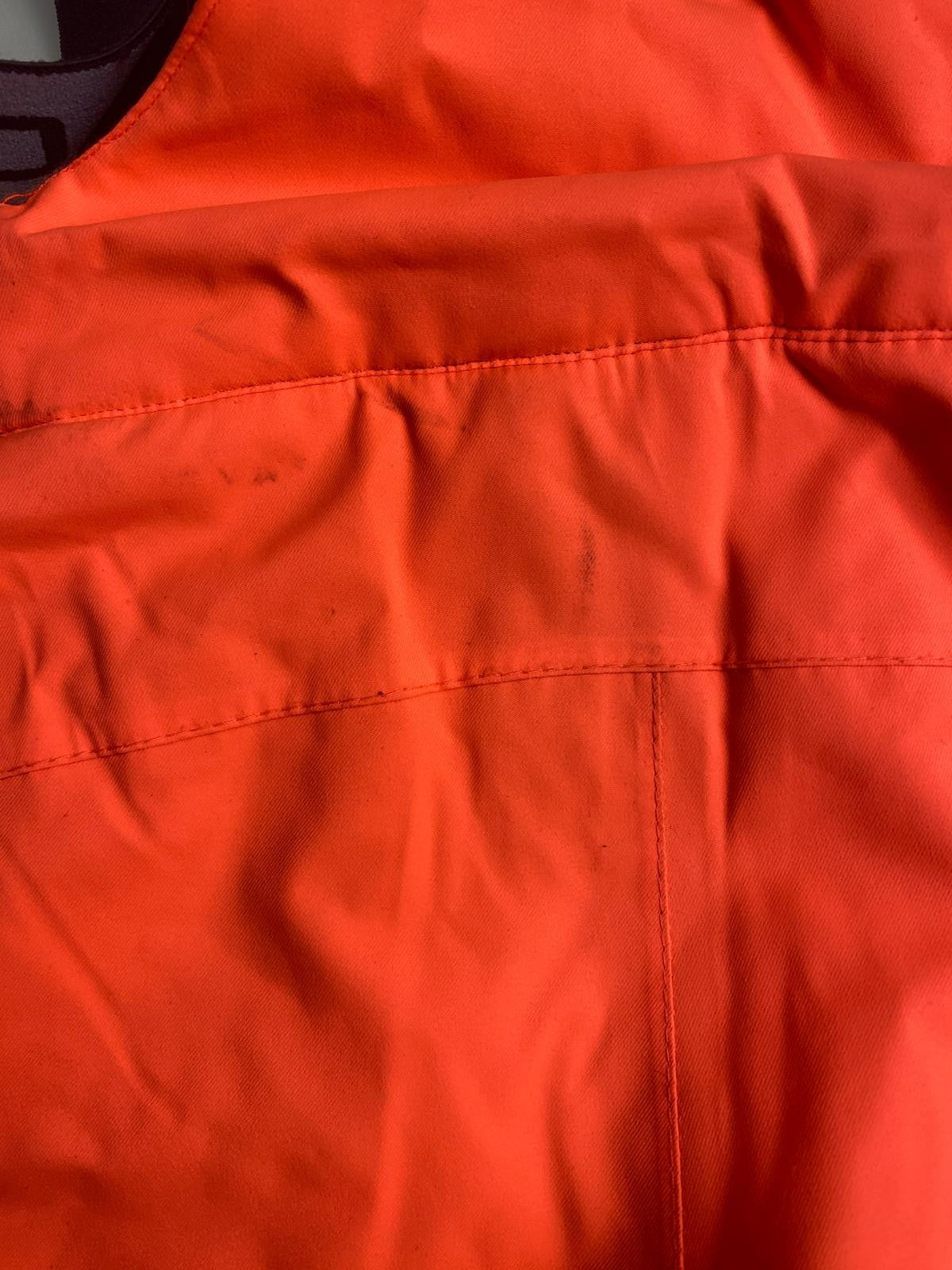 Pantaloni da sci arancione fluo con bretelle -difetto