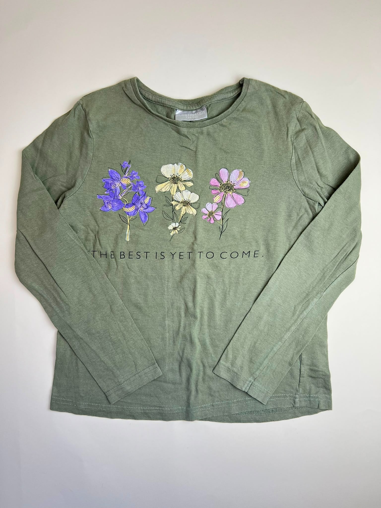 Maglietta a maniche lunghe verde con stampa floreale