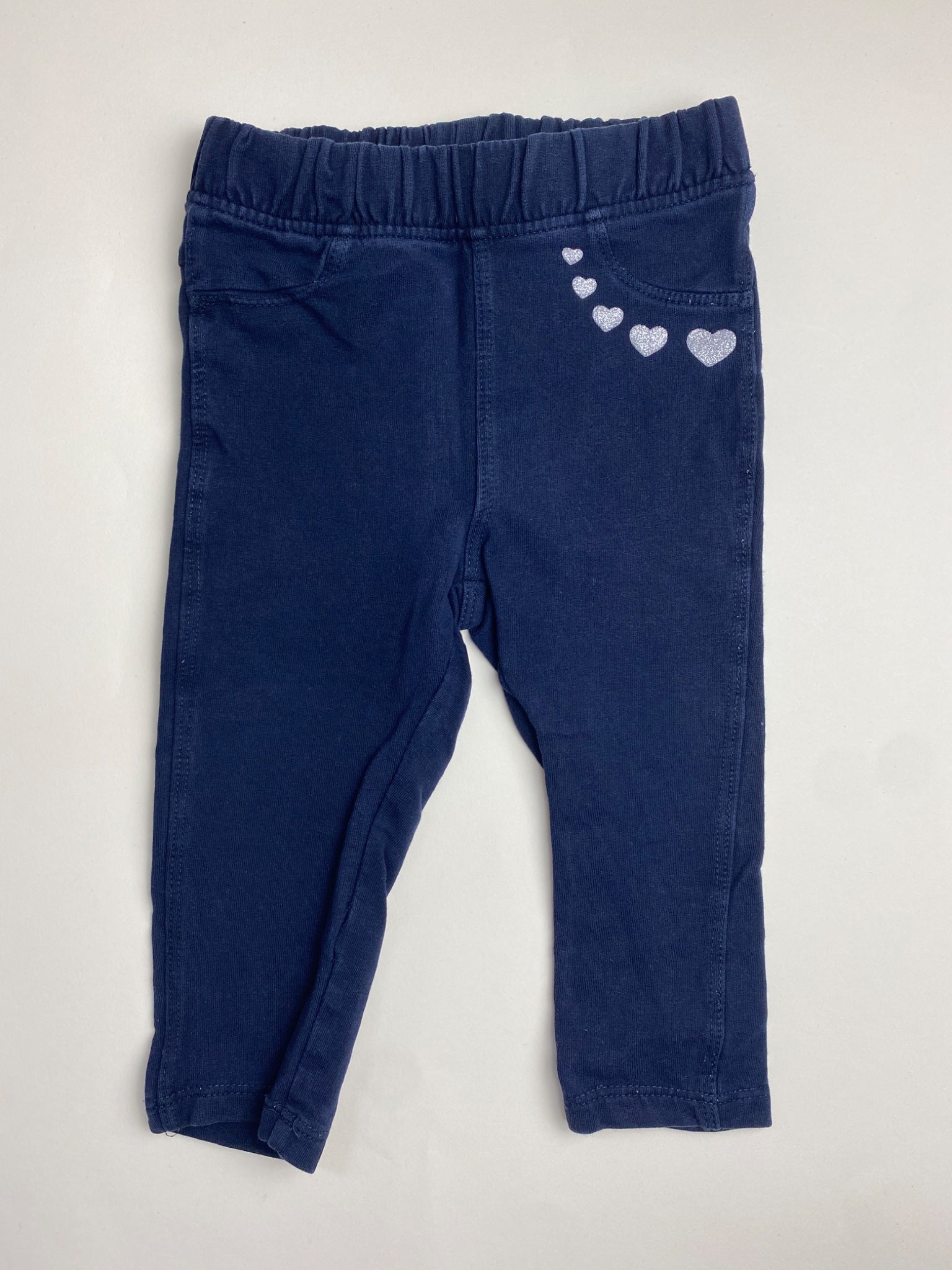 Leggings per neonata blu scuro con cuori glitter