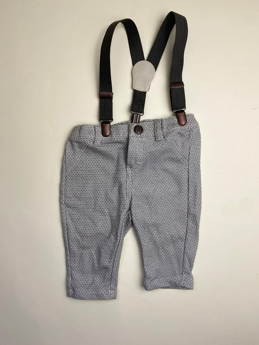 Pantalone con bretelle fantasia geometrica
