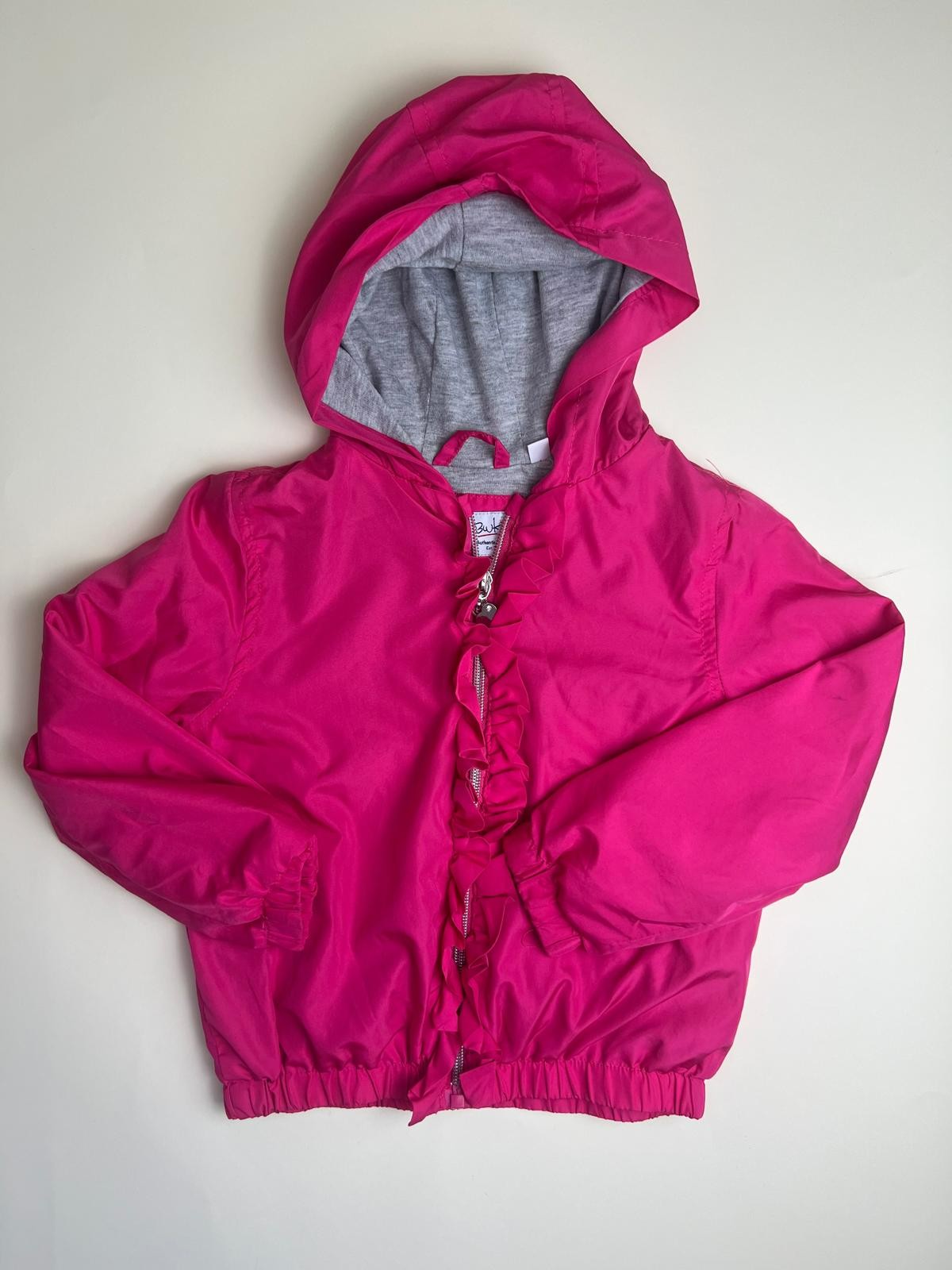 Giacca con cappuccio fucsia per bambina