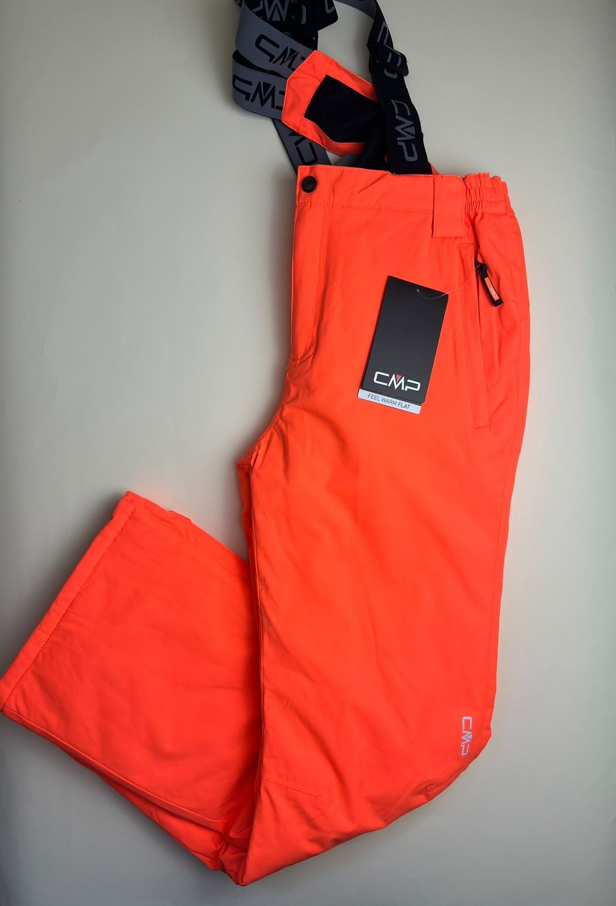 Pantaloni da sci CMP arancioni con bretelle - manca uno di due bottoni (si chiude) , macchia