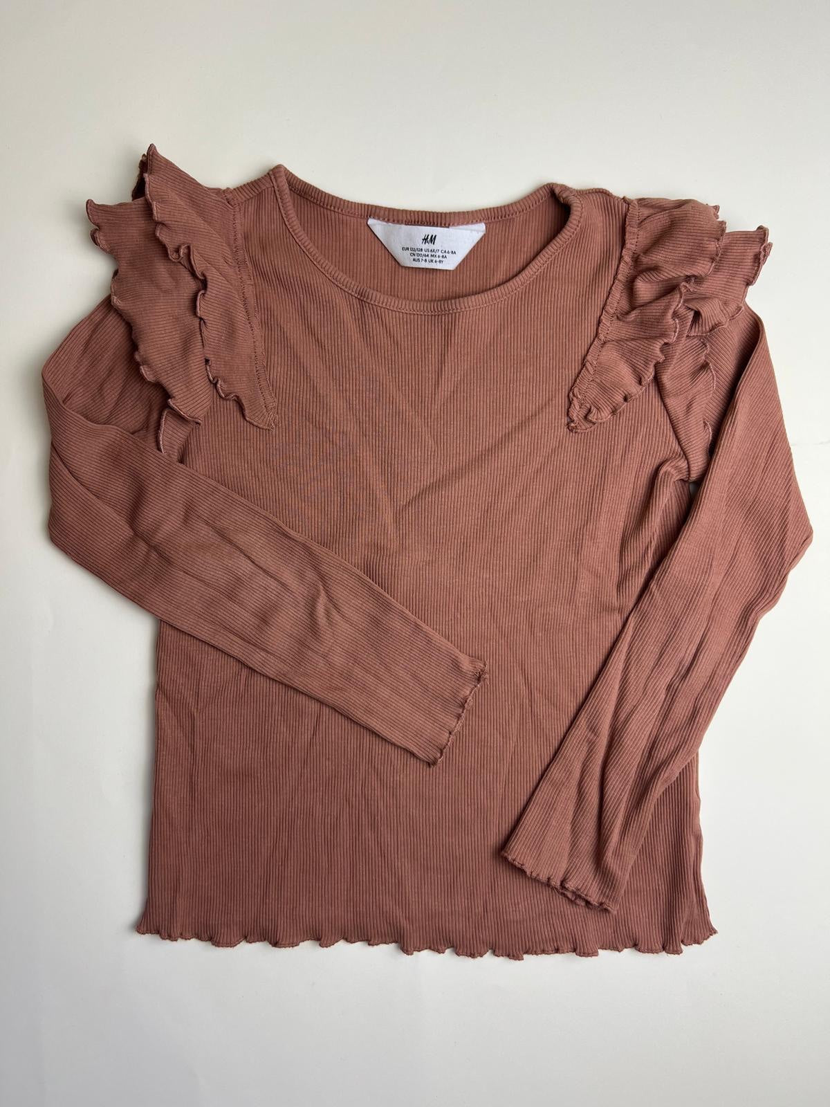 Top a maniche lunghe a costine con volant H&M
