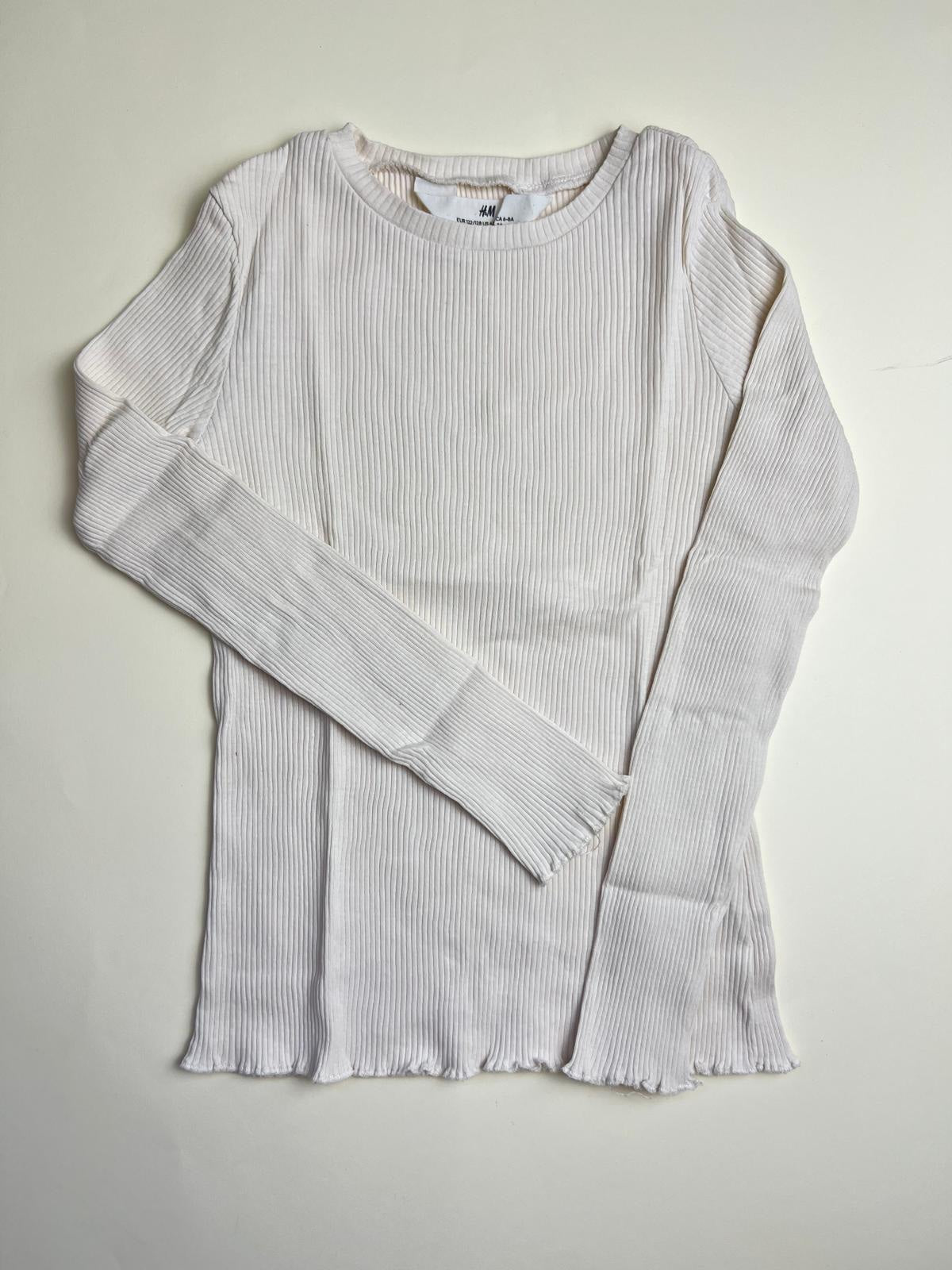 Top a maniche lunghe in maglia a costine