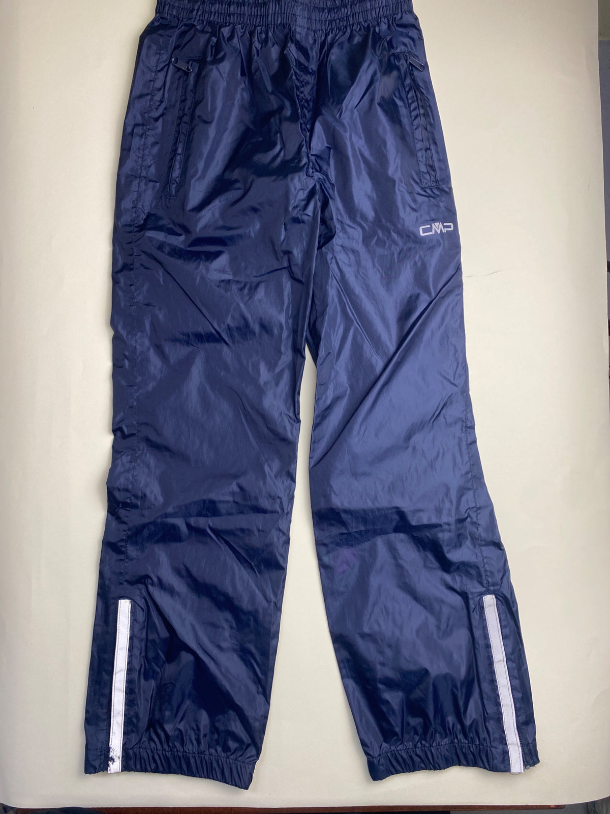 Pantaloni per pioggia - difetto di produzione