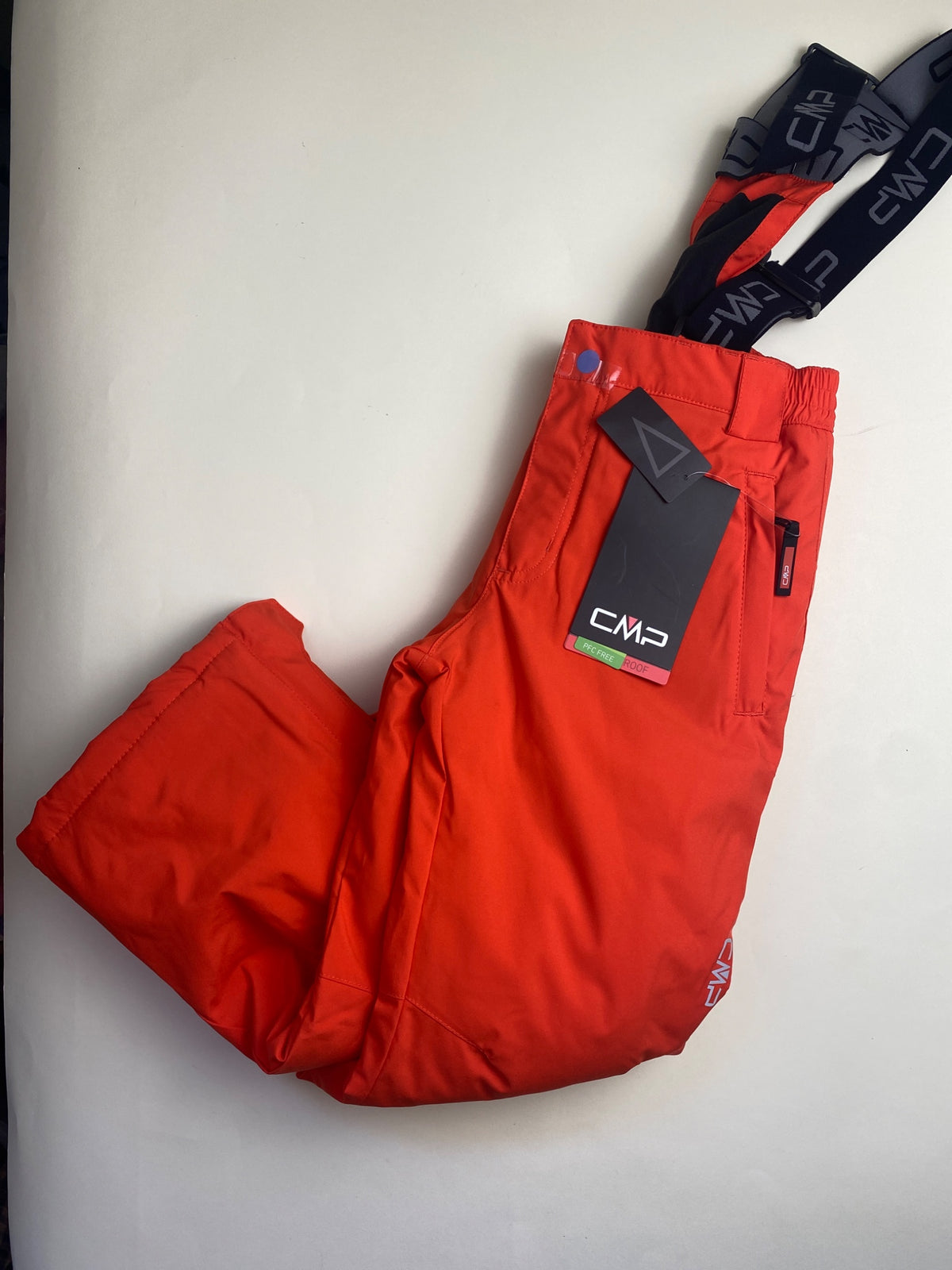 Pantaloni da sci CMP arancioni con bretelle- manca un bottone su due (si chiude)