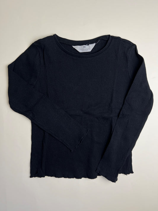 Maglia a maniche lunghe nera a costine con bordo ondulato