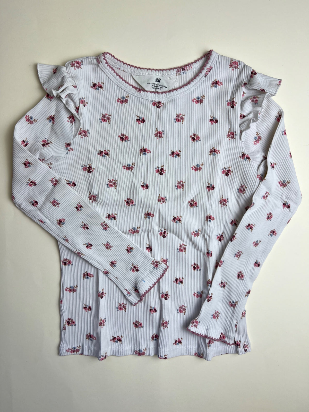 Maglia a maniche lunghe a costine con stampa floreale e volant H&M