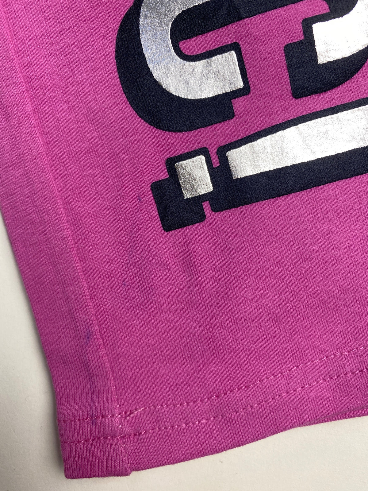 Leggings fucsia con stampa "MUSIC!" - difetto su fondo gamba
