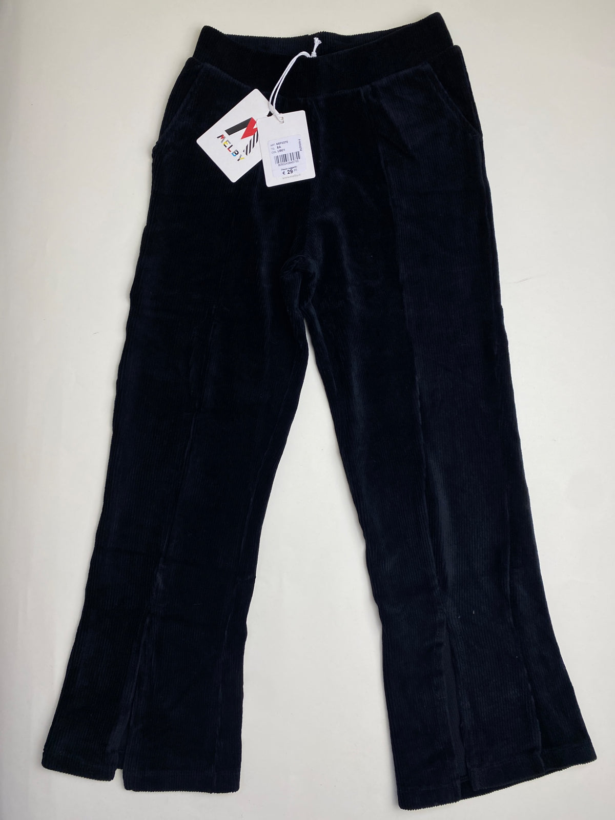 Pantaloni in velluto a coste con spacco