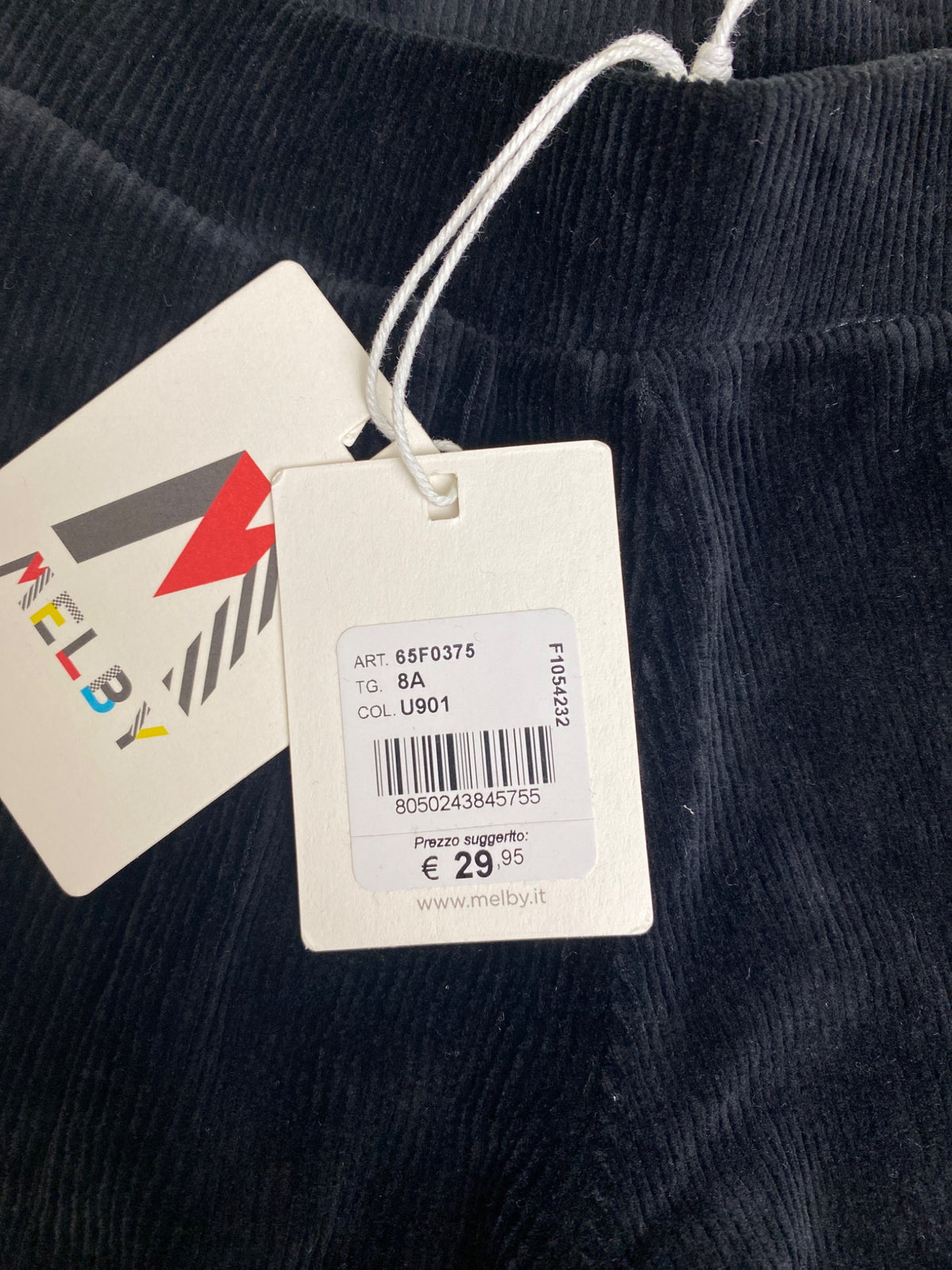Pantaloni in velluto a coste con spacco