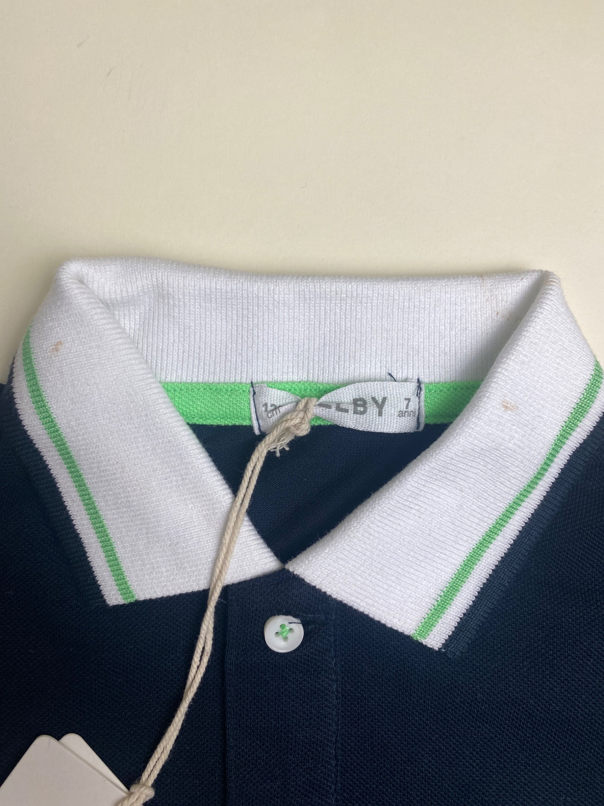 Polo bambino Melby blu navy con dettagli verdi - macchiette su colletto
