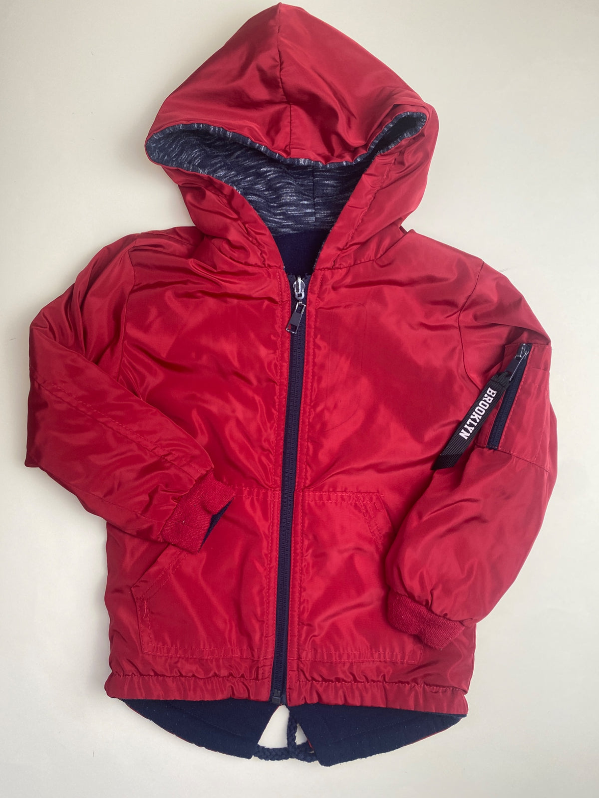 Giacca con cappuccio reversibile per bambini