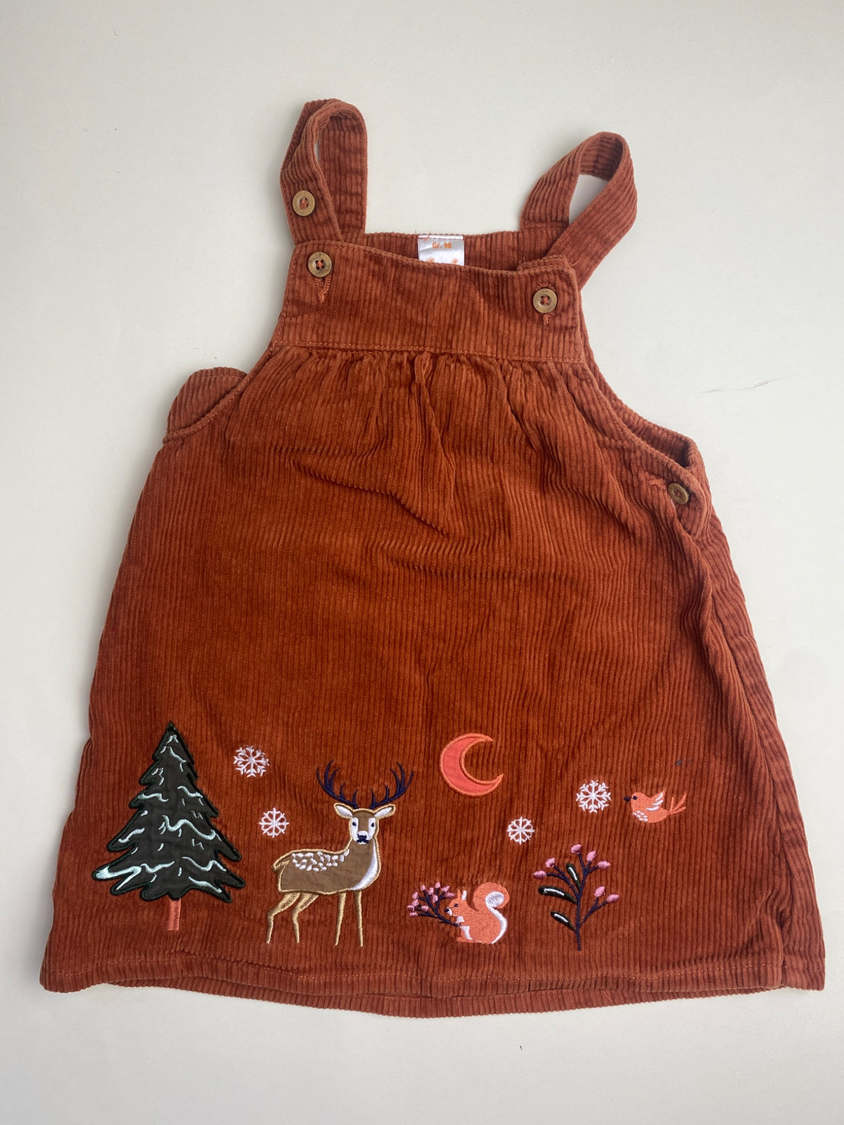 Salopette vestito in velluto a coste per bambina con ricami a tema bosco