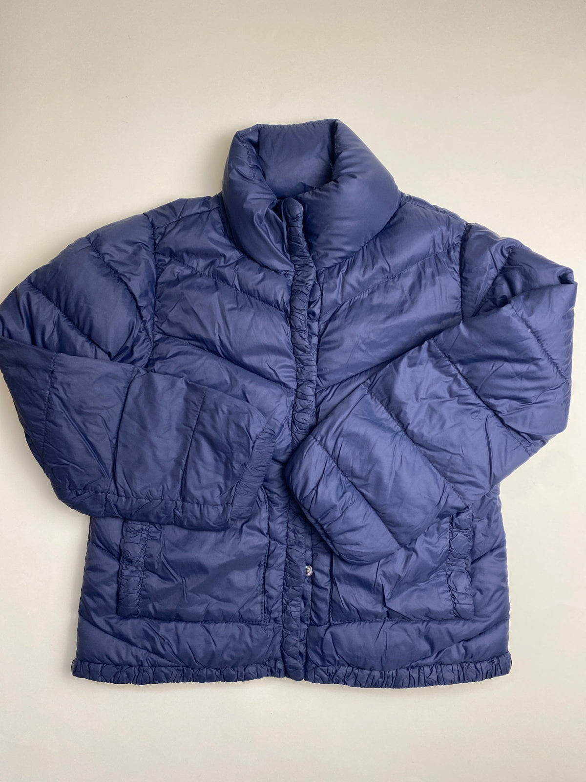 Piumino lightweight blu scuro con collo alto